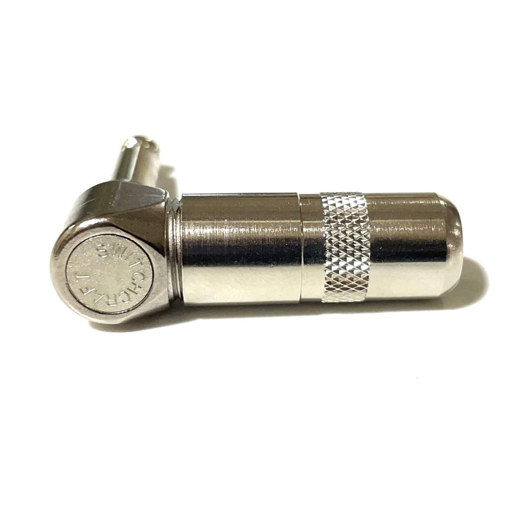 Metal right-angle drill bit on a white background
