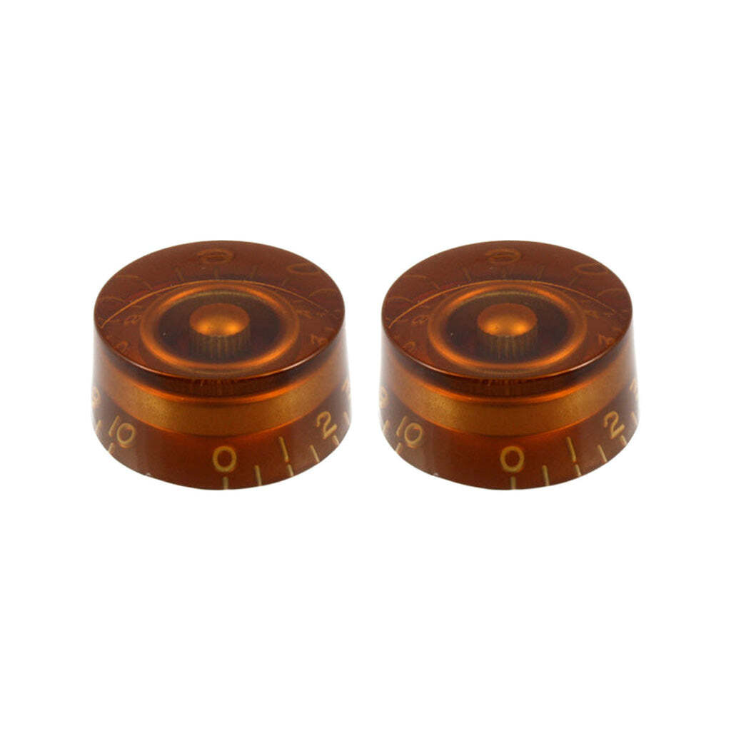 Two brown guitar tuning pegs on a white background