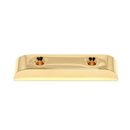 Gold metal bracket on a white background