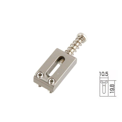 Metal guitar bridge with spring on a white background