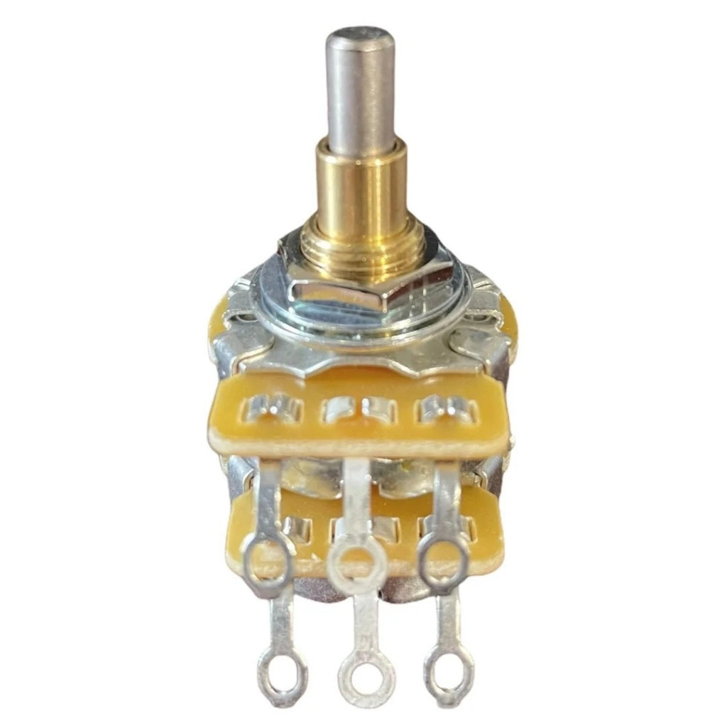 Potentiometer with gold and silver components on a white background