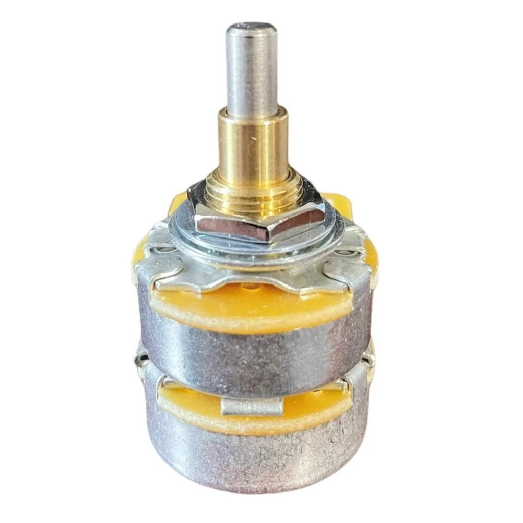 Mechanical component with metal and yellow parts on a white background