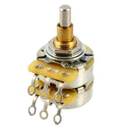 Potentiometer with gold and silver components on a white background