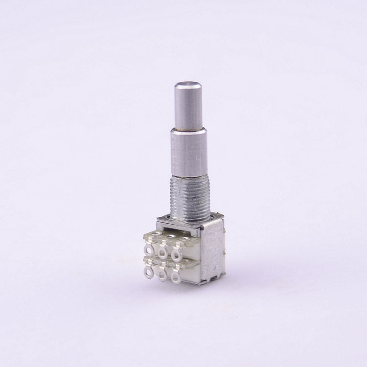 A small silver metal mechanical component with a threaded body, a cylindrical rod, and a multi-pin connector block, photographed on a plain light background.