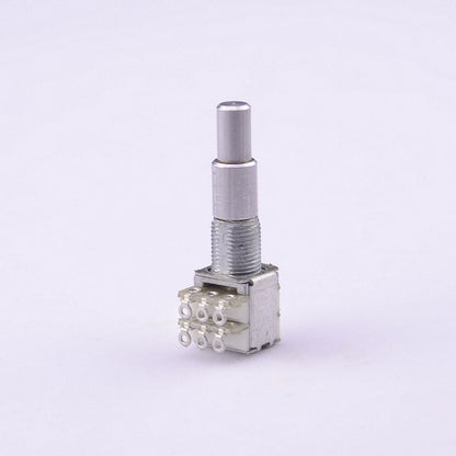A small silver metal mechanical component with a threaded body, a cylindrical rod, and a multi-pin connector block, photographed on a plain light background.
