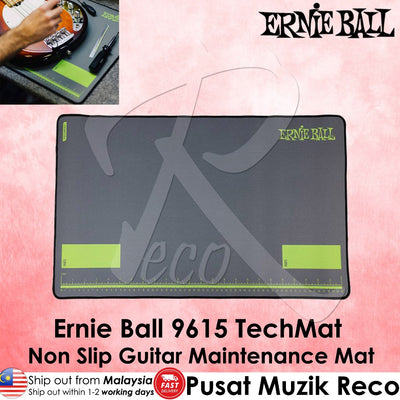Ernie Ball 9615 TechMat non-slip guitar maintenance mat in dark gray with lime green accents, shown on a pink background with product text and a small inset photo of a hand using it.
