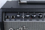 Fender guitar amplifier with control knobs and branding