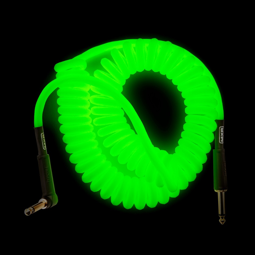Green coiled cable on a black background