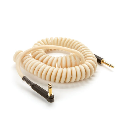Coiled audio cable with right-angle connectors on a white background