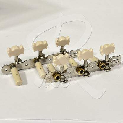 Six guitar tailpiece tuners with cream-colored knobs and metal hardware, arranged on a plain white background.