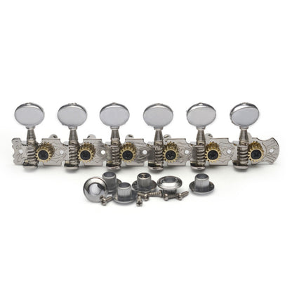 Six silver metal guitar tailpiece hardware components with round tuning knobs, springs, screws, and small gold-toned gears, arranged on a plain white background.