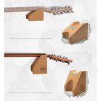Cork guitar stand shown with two guitar headstocks demonstrating use, plus three dimension callouts for different instrument widths. The image is not a plain product hero shot because the main purpose is to communicate size suitability, so subject_type is Measurement Chart.