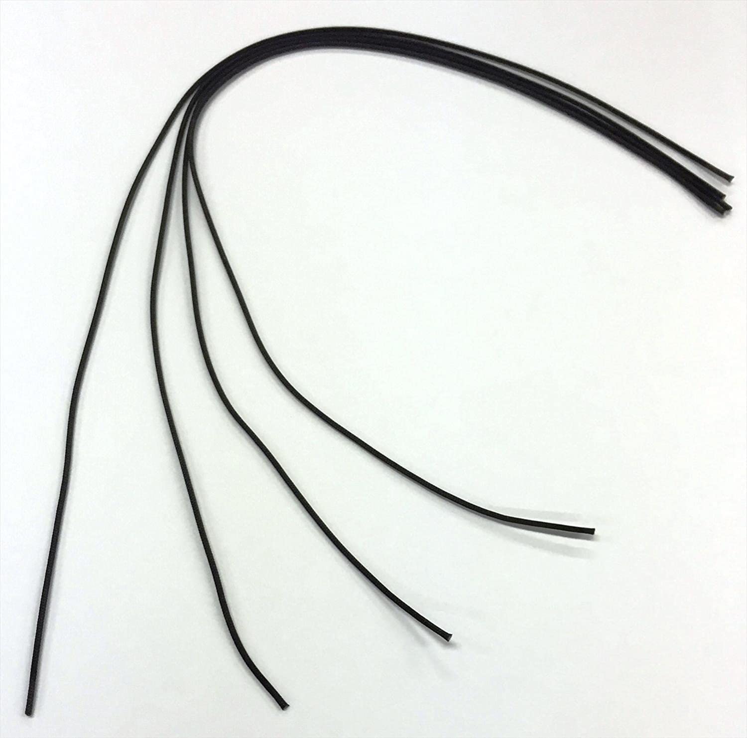 Set of black rubber strips on a white background