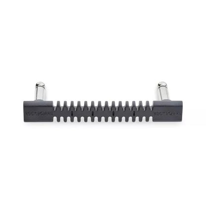 Black metal tool with cylindrical ends on a white background